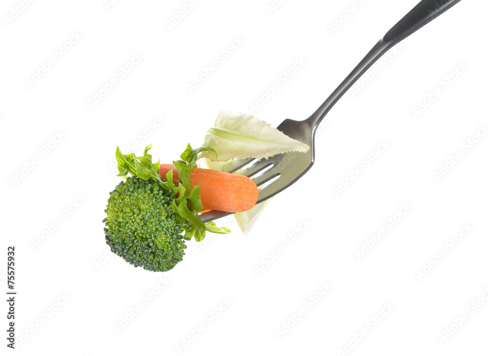 Mixed salad on fork isolated on white