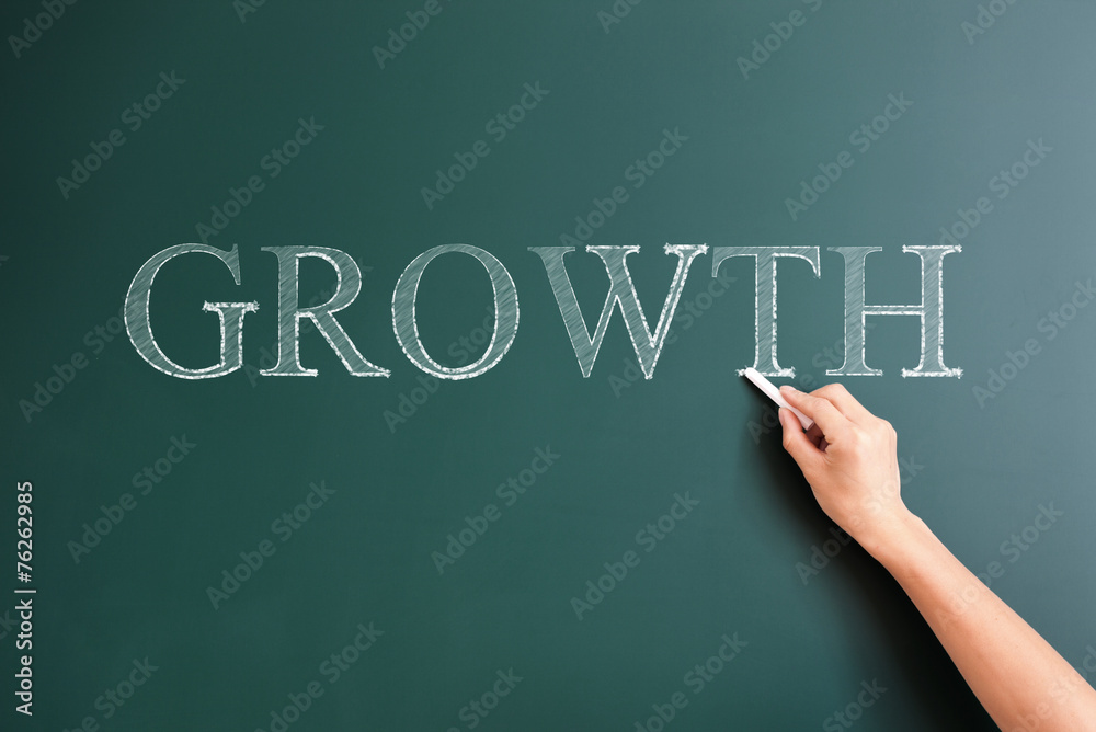 writing growth on blackboard