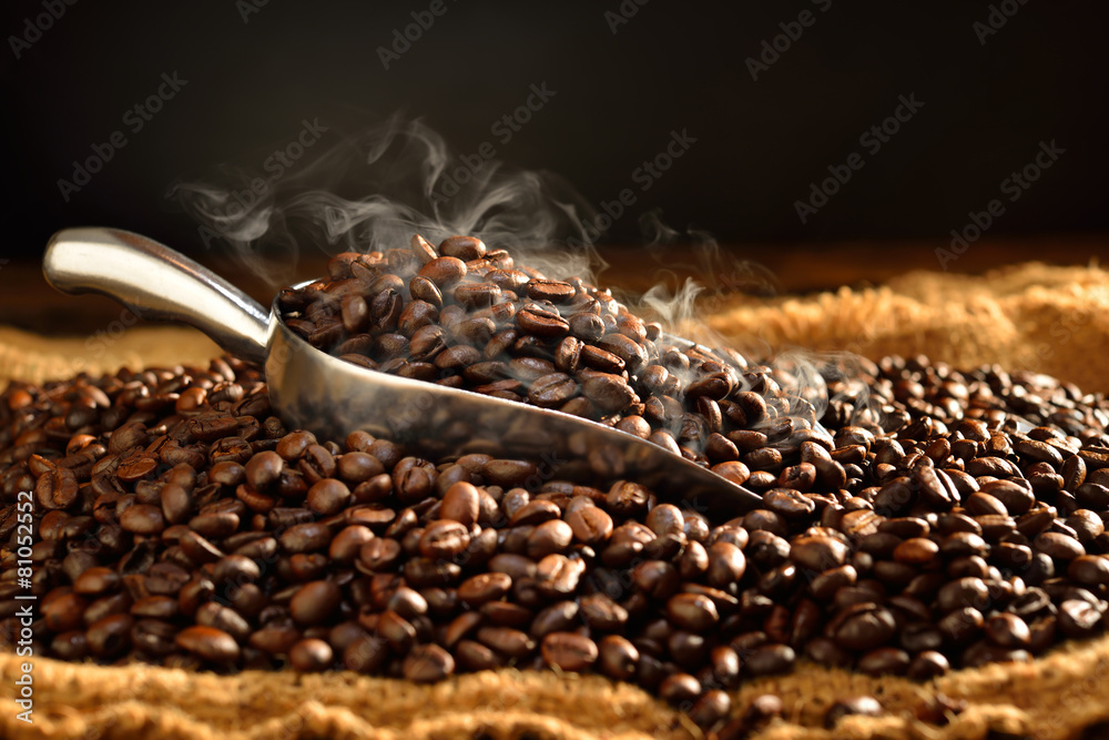 Coffee beans with smoke on burlap