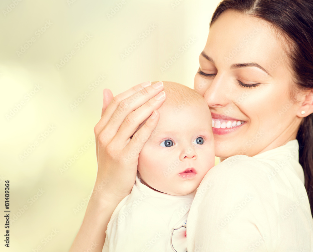 Happy mother and her newborn baby. Maternity concept
