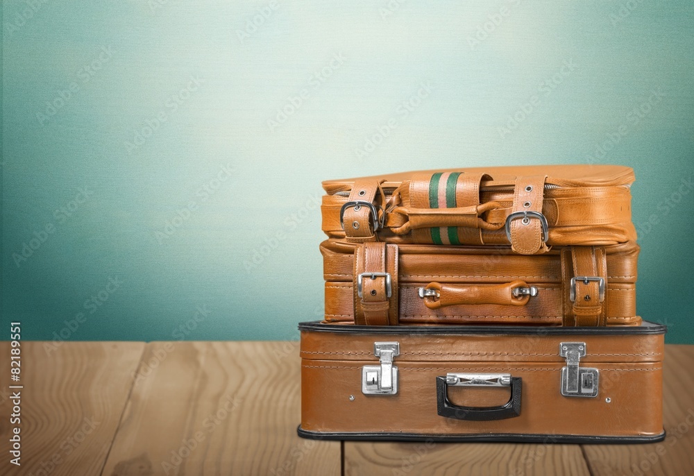 Travel. Beautiful old blue and brown suitcases - retro style