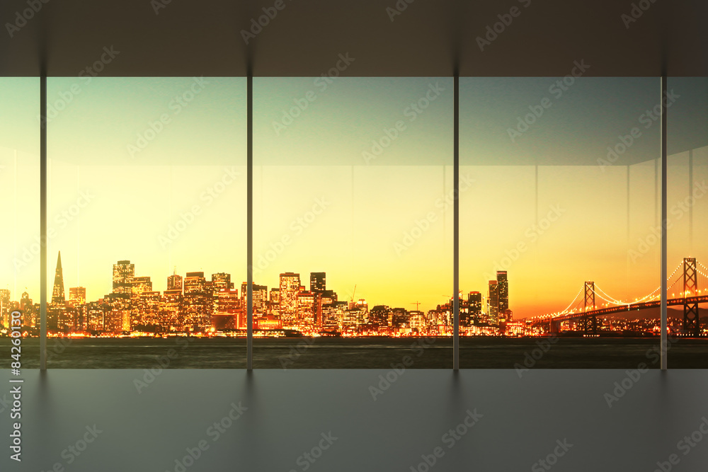 empty office at sunset with view to the skyline