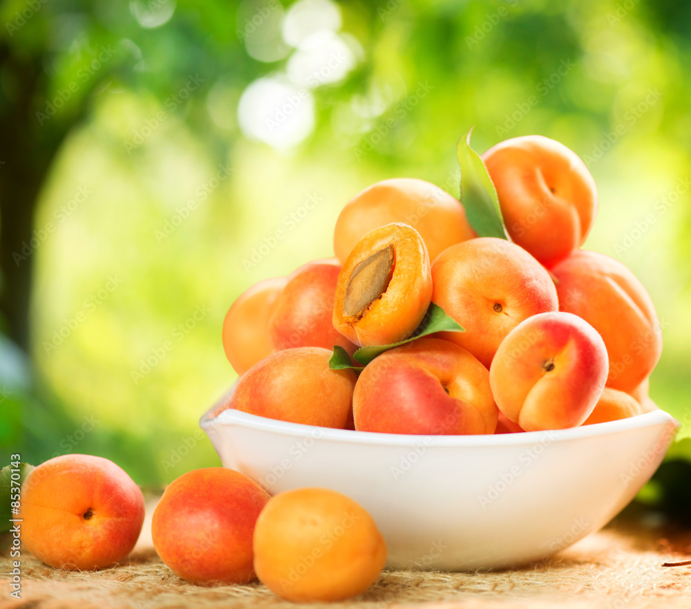 Apricot. Ripe organic apricots on a wooden table
