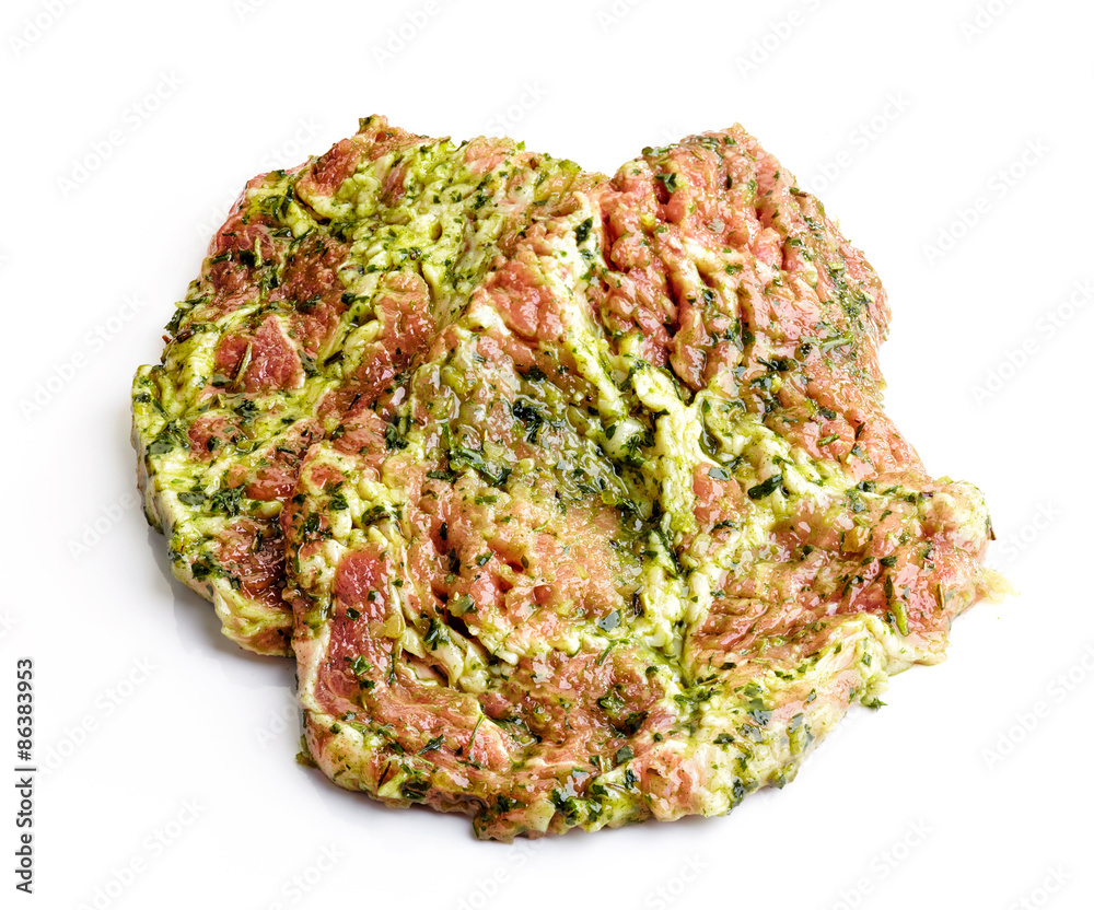 raw meat cuts in green marinade