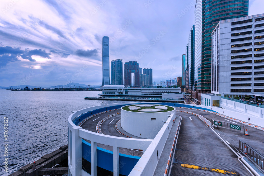 park lot and modern skyline at hong kong harbor