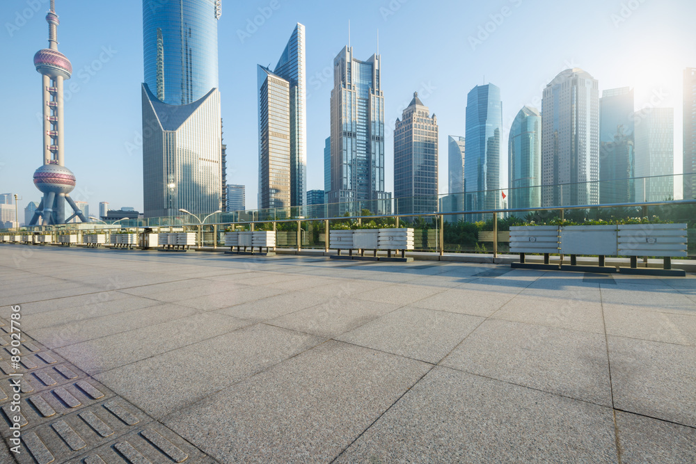 Empty road in front of the modern architecture，in Shanghai, China