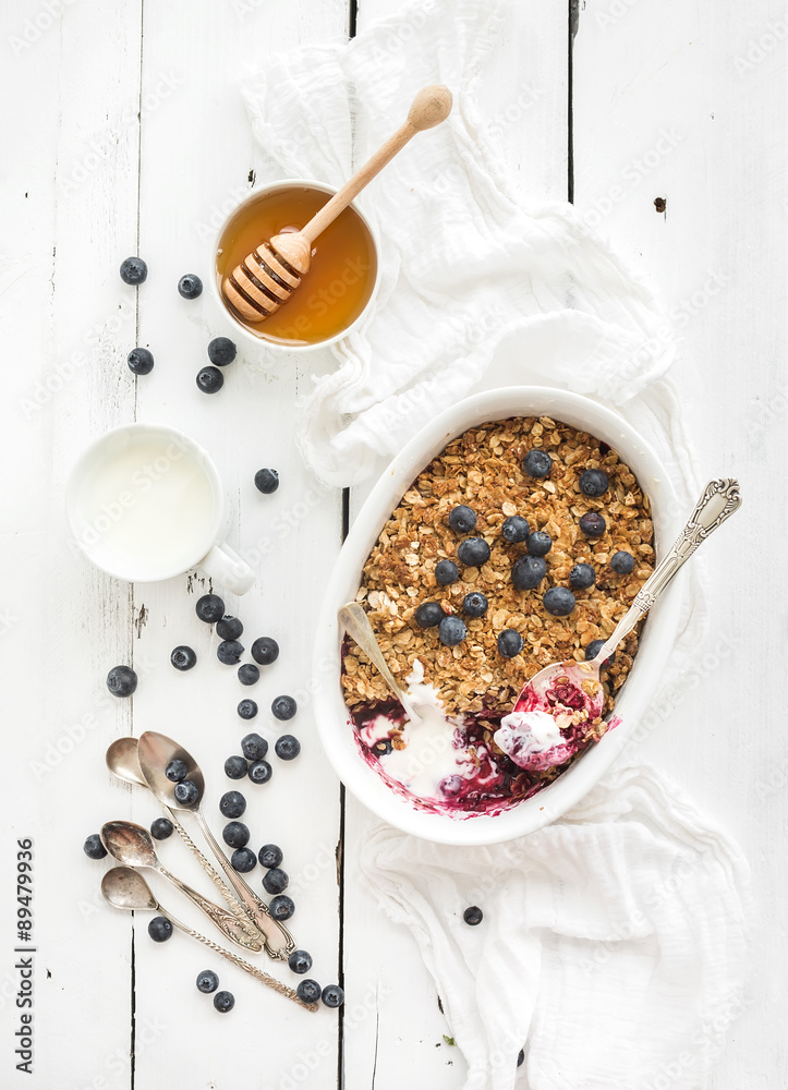 Healthy breakfast. Oat granola berry crumble with fresh