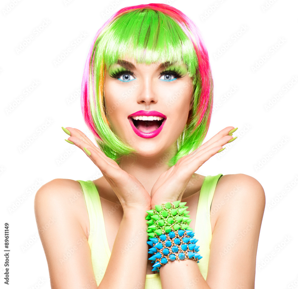 Surprised beauty fashion model girl with colorful dyed hair