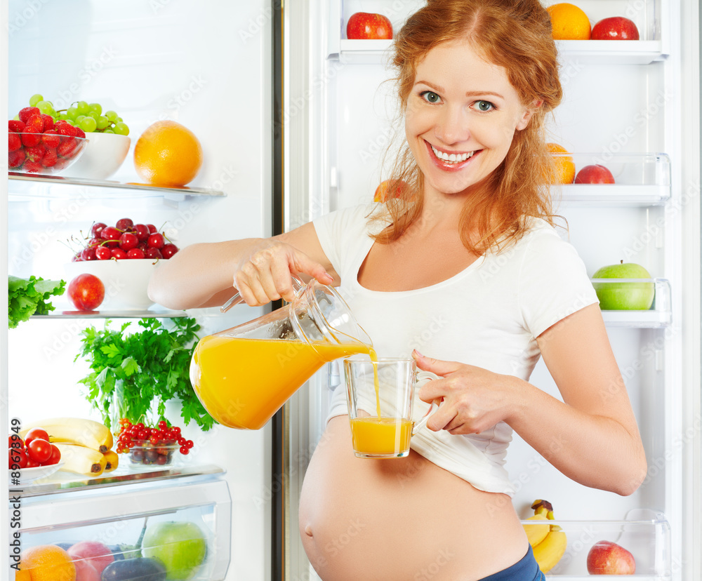 怀孕期间的营养和饮食。孕妇带橙色