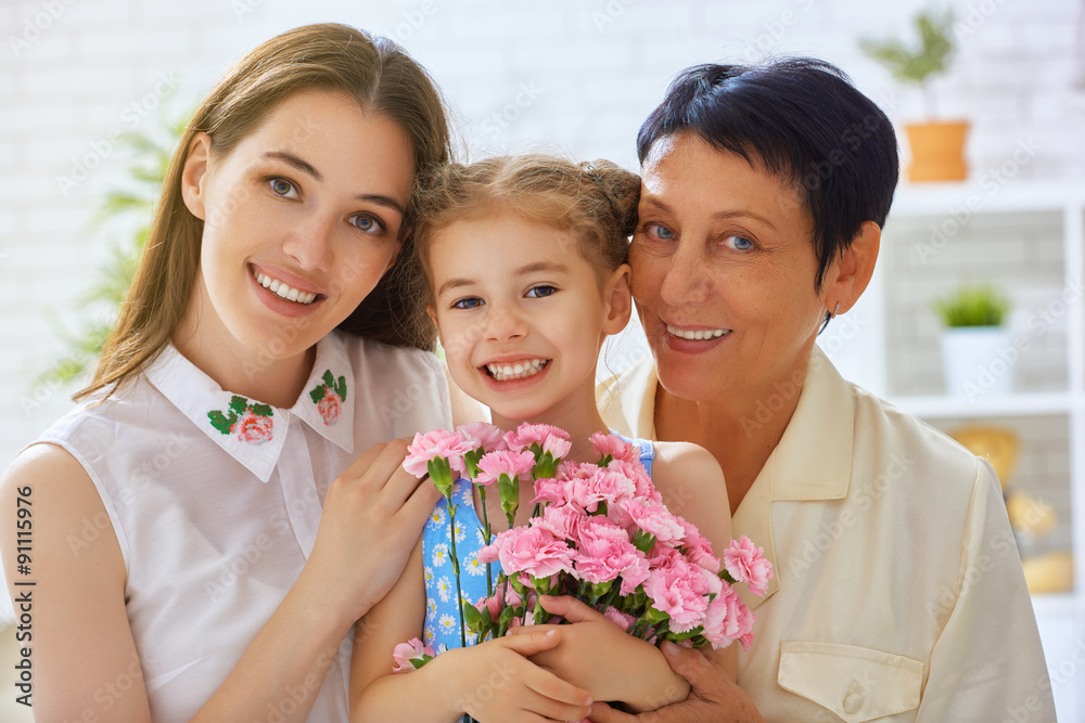 mother and daughter with flowers