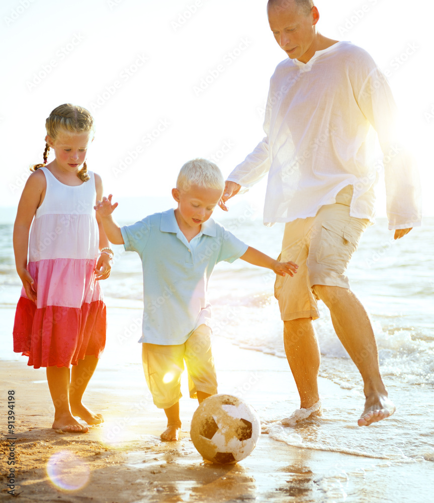 Family Beach Football Holiday Soccer Togetherness Concept