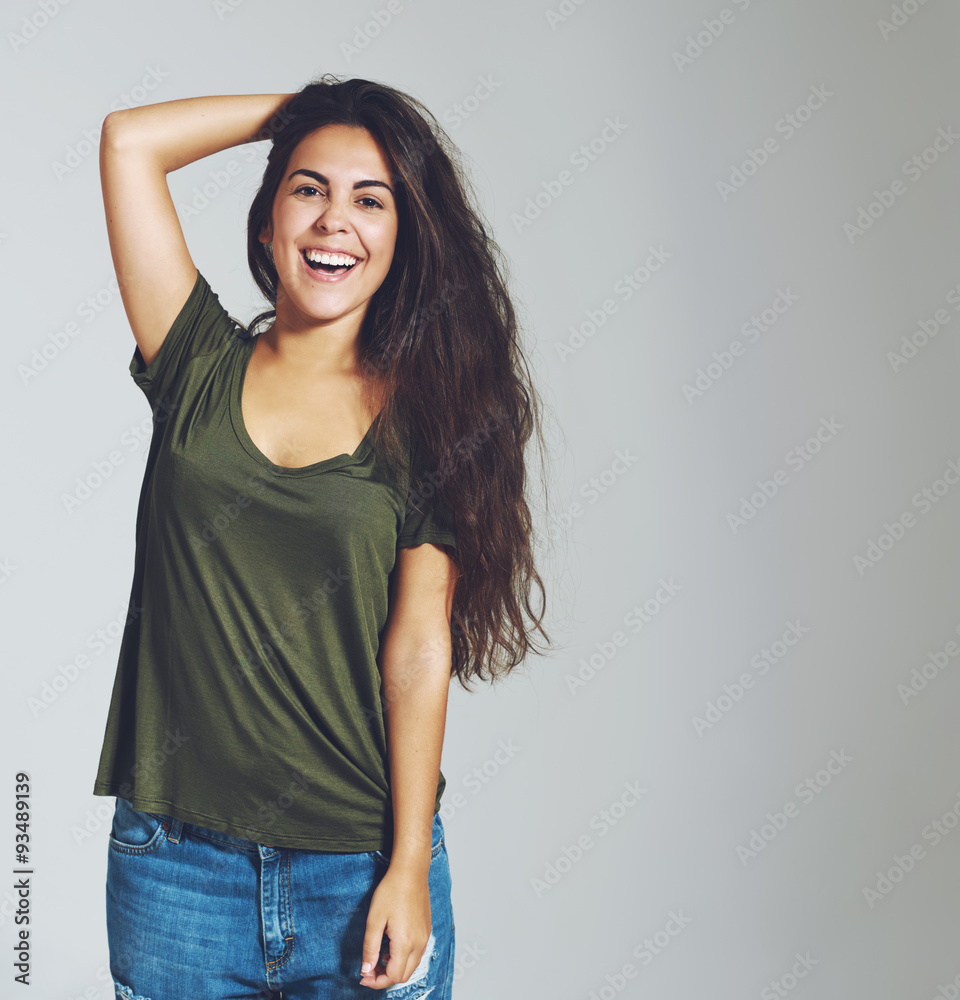 Brunette woman smiling and laughing
