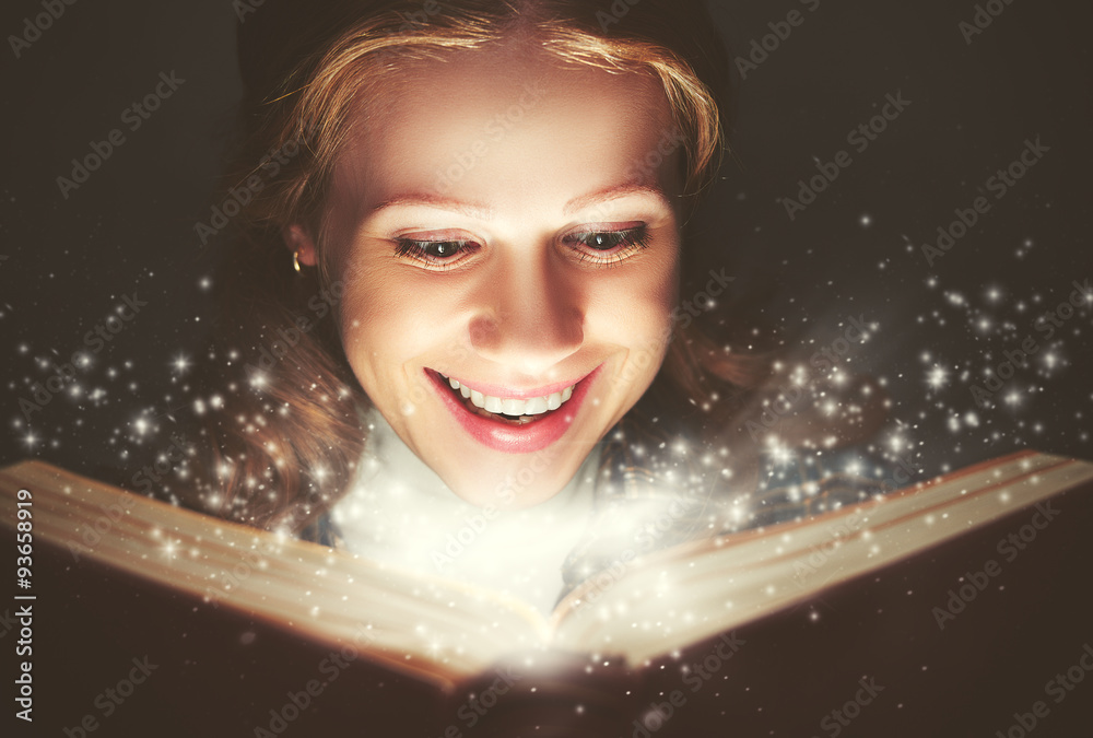 woman reading a magic book