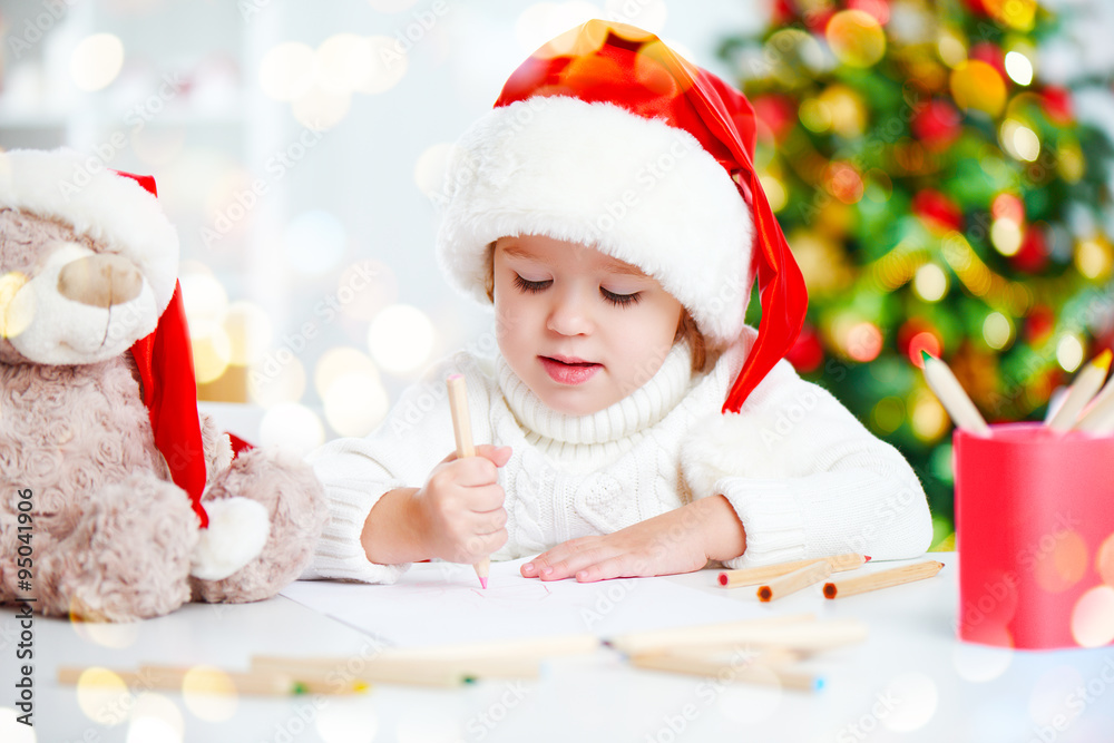 child before Christmas writes a letter to Santa