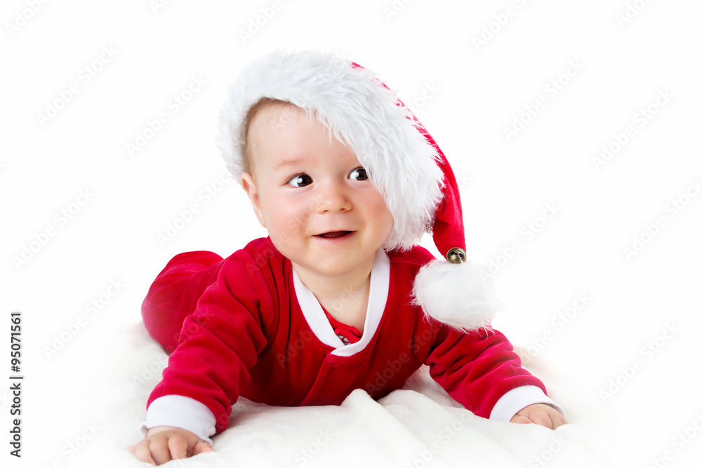 Baby isolated on white background in santa costume