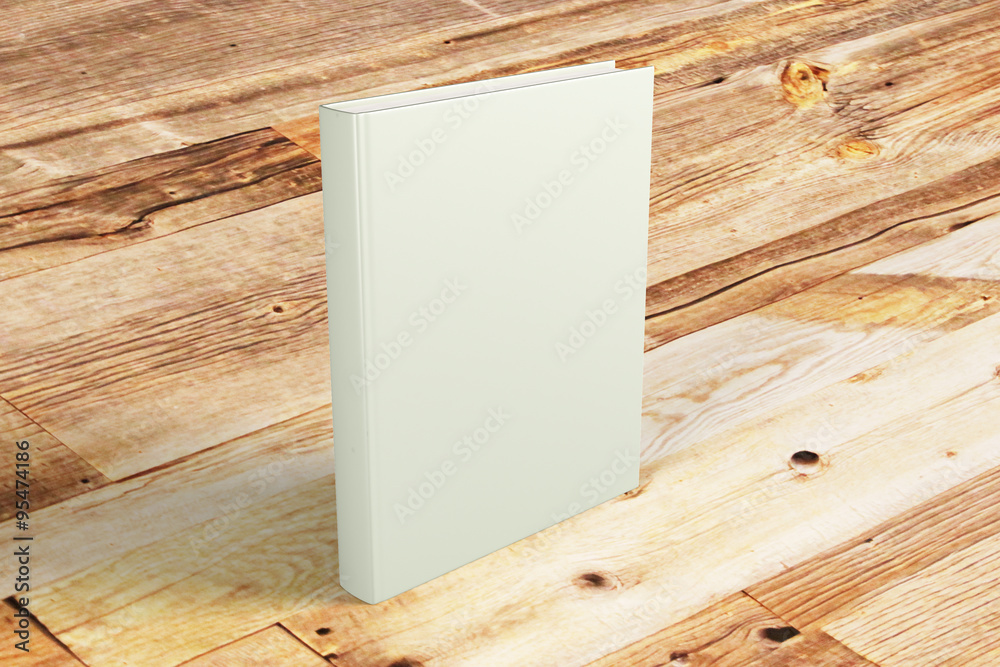 Blank cover of book on wooden table, mock up