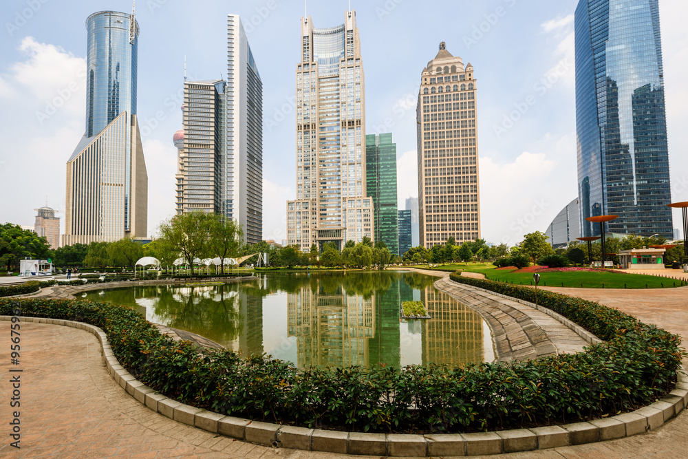 park and skyscrapers under the blue sky in shanghai，china