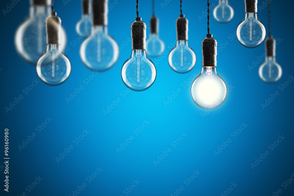 创意和领导力概念老式白炽爱迪生灯泡开启
