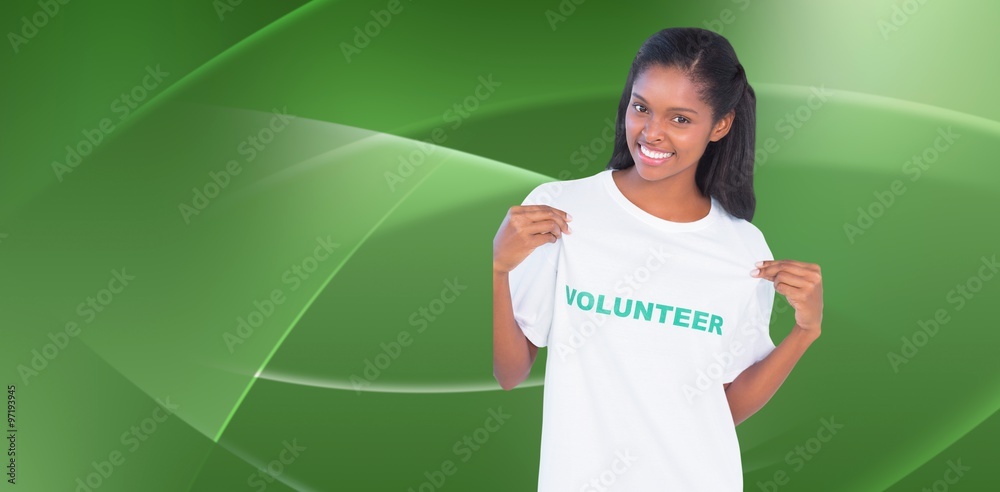 Composite image of young woman wearing volunteer tshirt