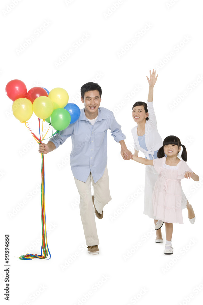 Portrait of family with balloons
