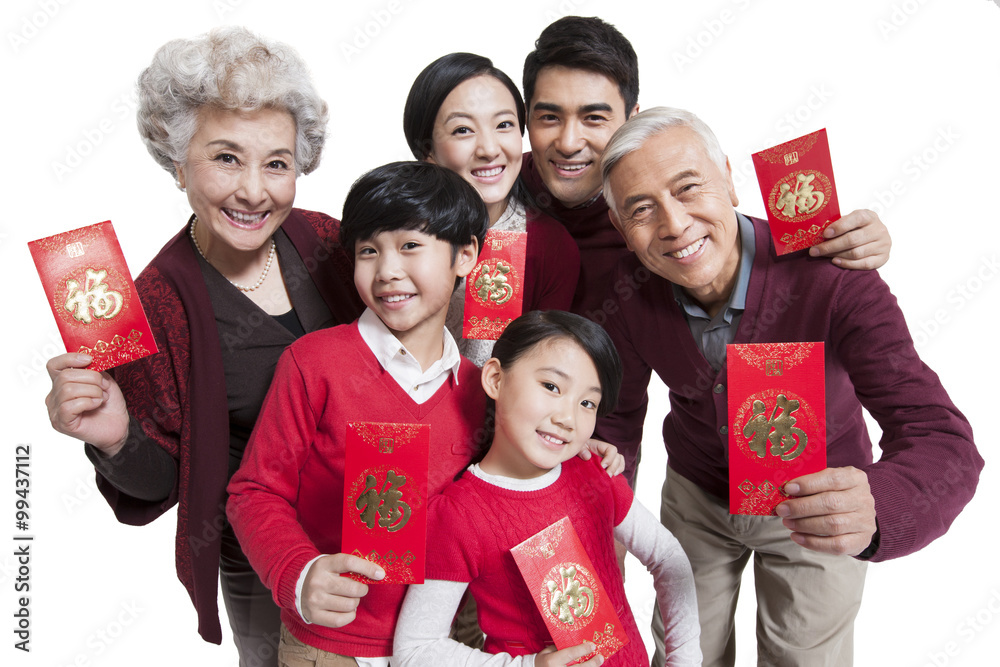 Happy family showing red pockets celebrating Chinese New Year