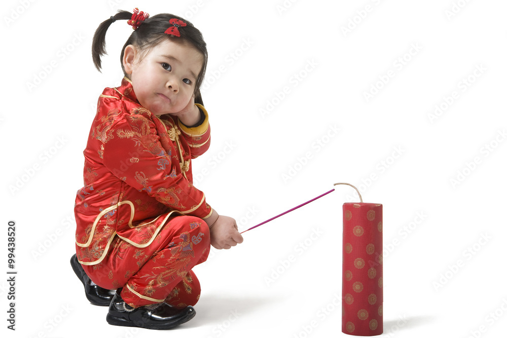 Young girl playing firecrackers