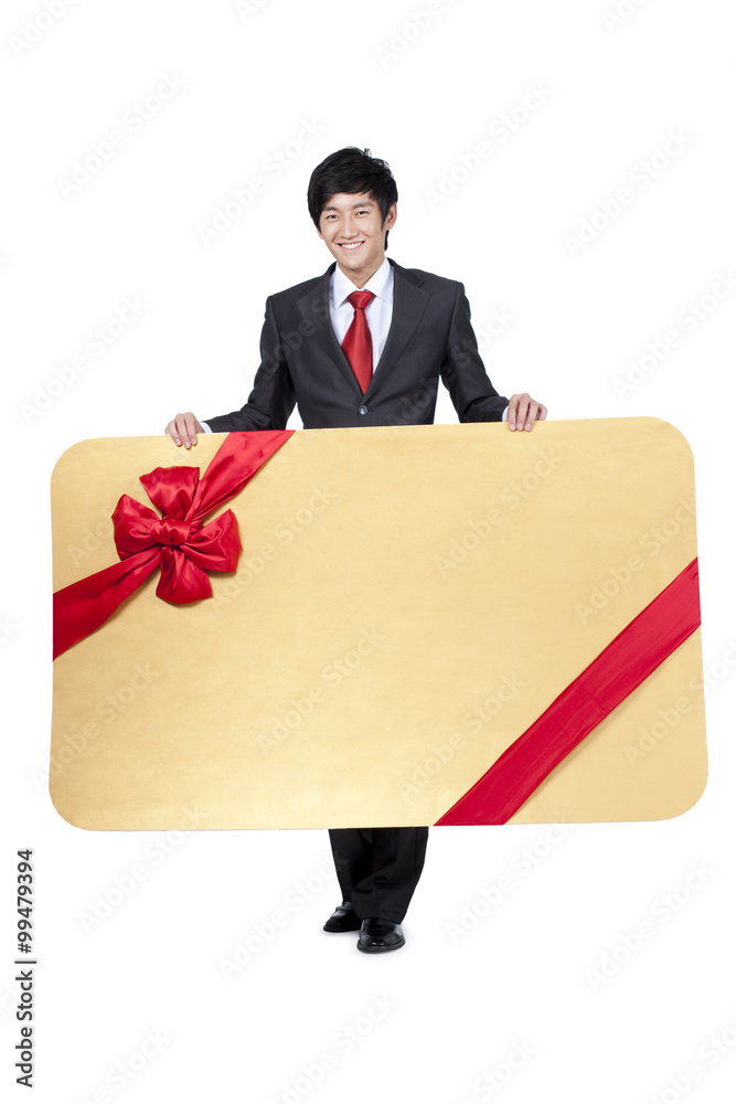 Happy Businessman Holding an Oversized Wrapped Card