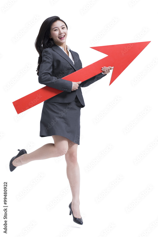 Businessman with red arrow sign