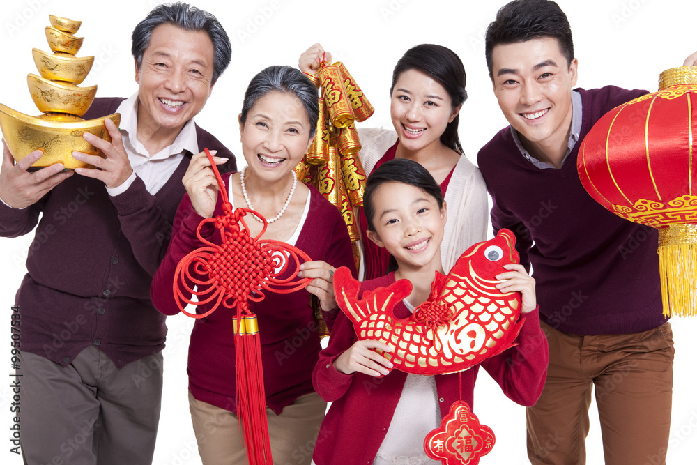 Happy family celebrating Chinese New Year with decorations