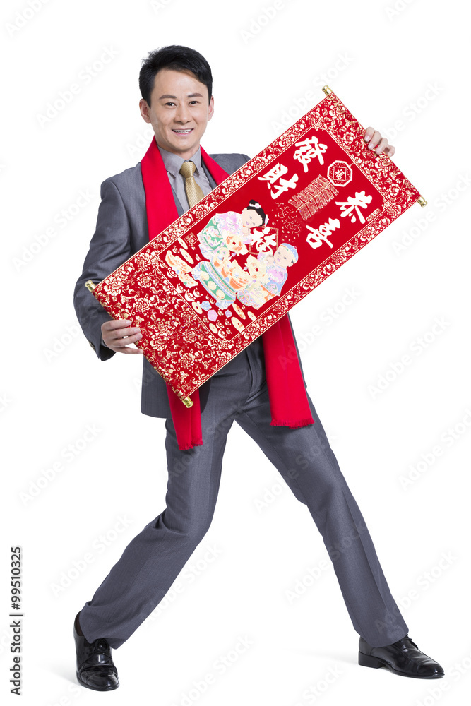 Cheerful businessman with new year painting