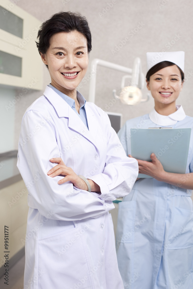 Dentist and nurse in dental clinic