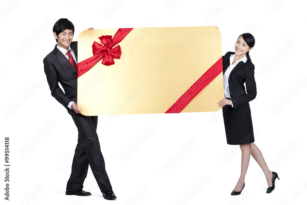 Colleagues Holding an Oversized Wrapped Card
