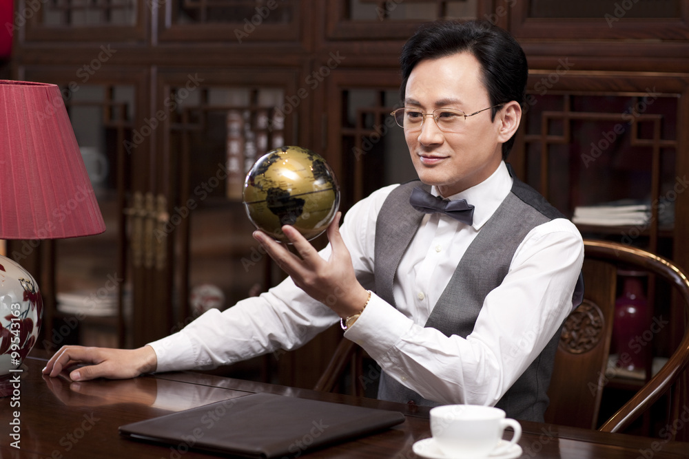 Businessman with a globe