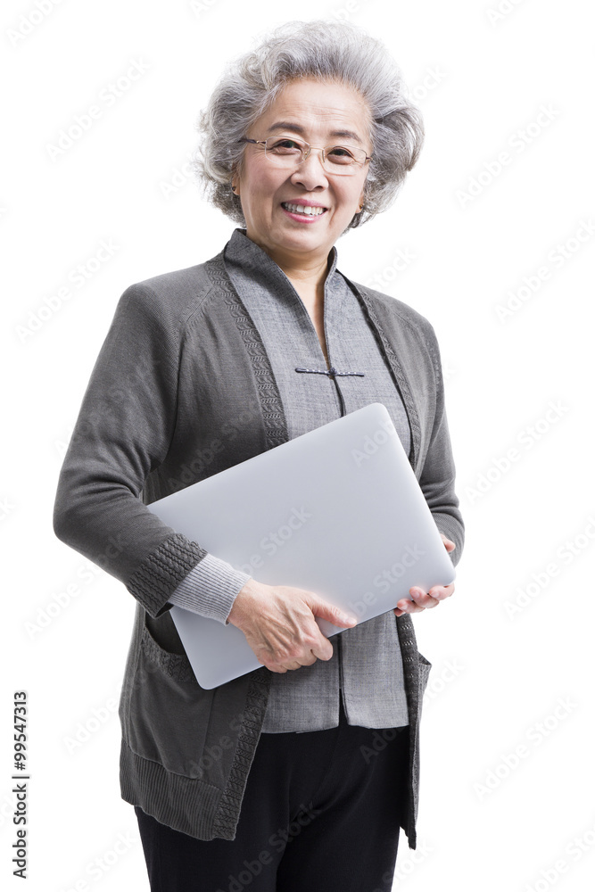 拥有笔记本电脑的快乐老年女性