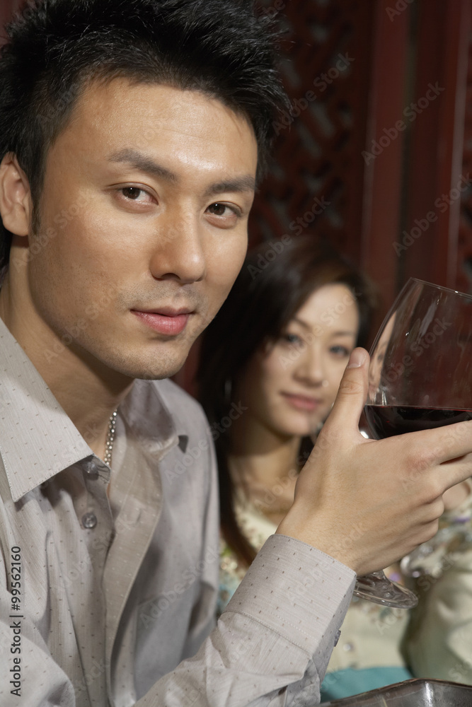 Man Drinking A Glass Of Wine
