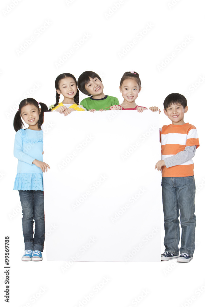 A group of classmates holding up a blank sign