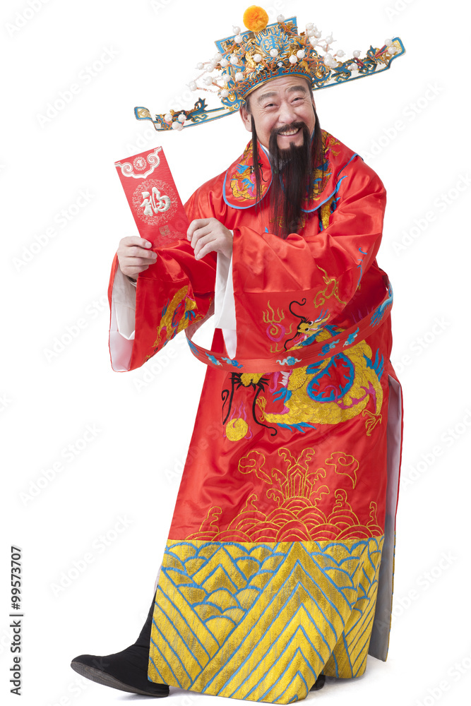 Chinese God of Wealth with red packet celebrating Chinese New Year