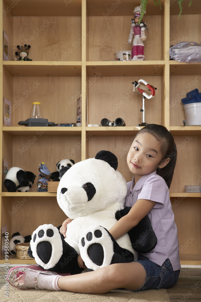Portrait Of Young Girl With A Stuffed Toy Panda
