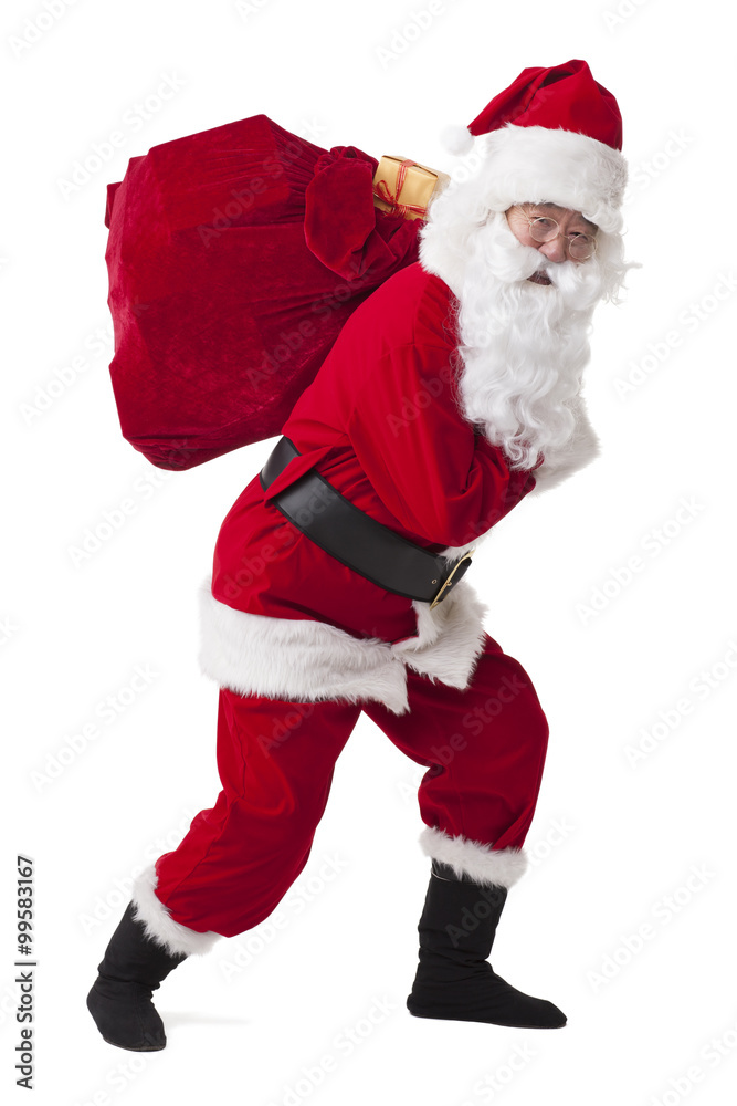 Santa Claus carrying sack of gifts
