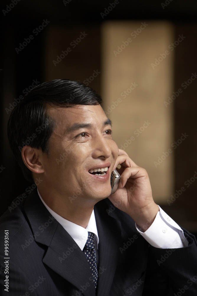 A business leader on his cell phone