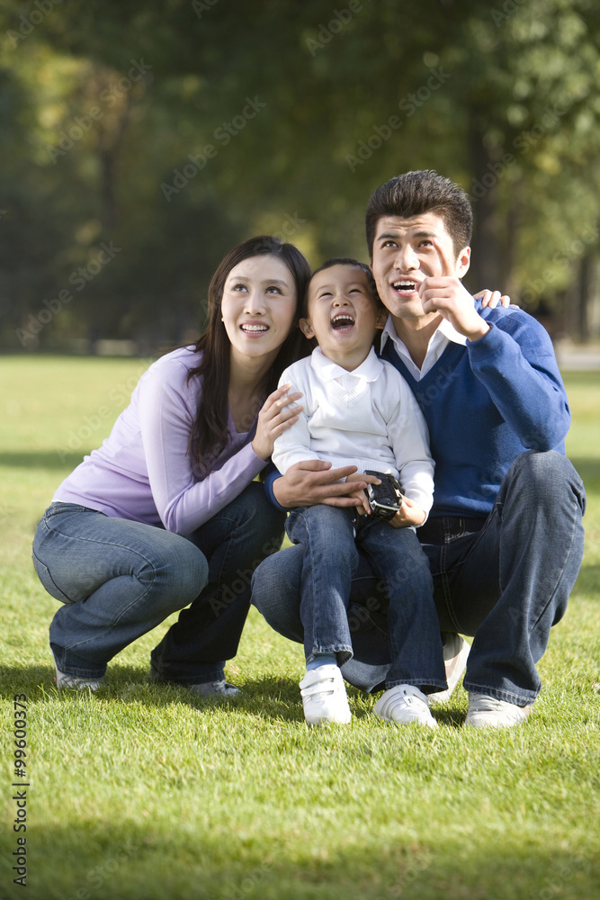 Portrait of young family at the park