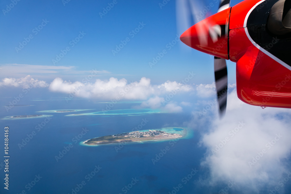 Detail of sea plane engine above Maldives islands