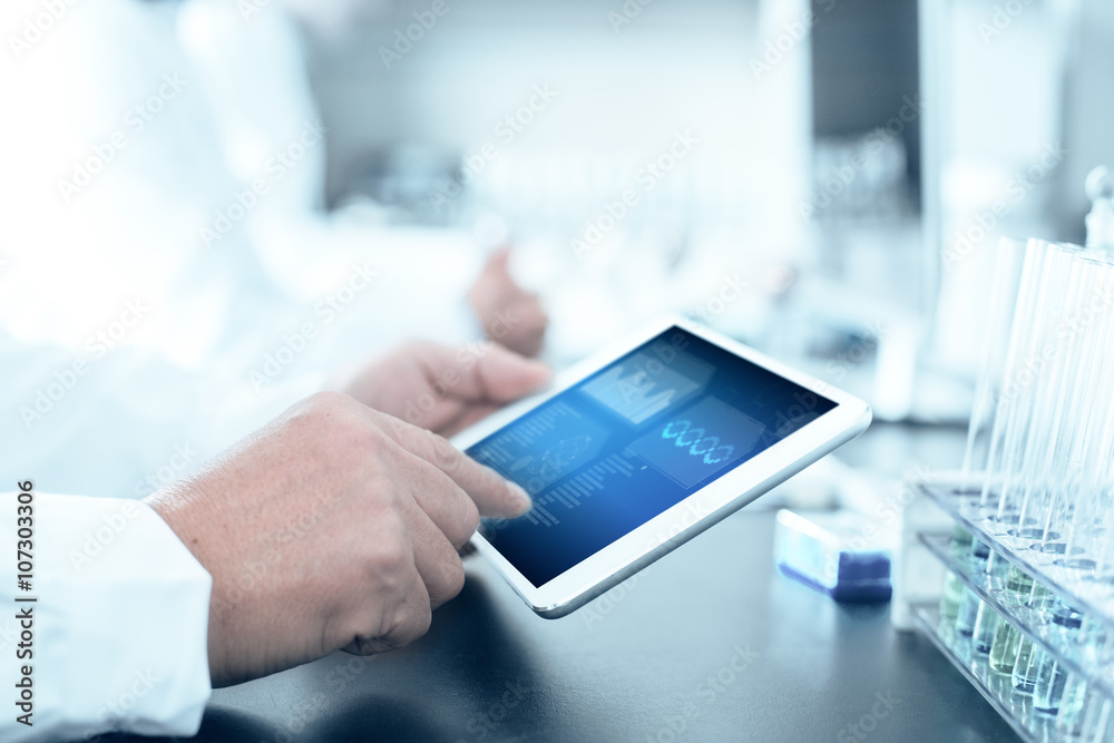 people analysis chemical experiment by tablet in modern lab