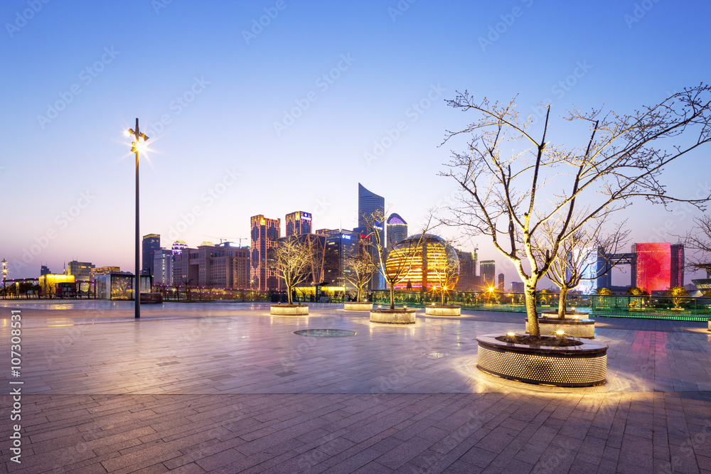 empty marble floor with cityscape and skyline of hangzhou