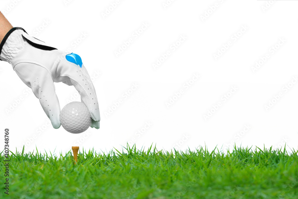 Hand hold golf ball with tee isolated on white background
