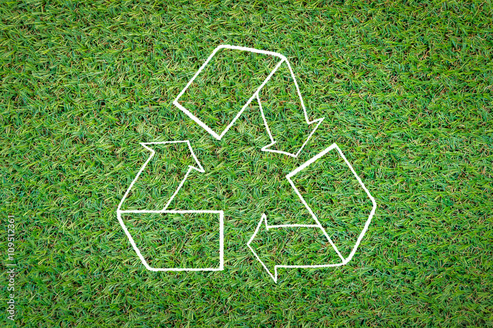 recycle symbol on green grass.jpg