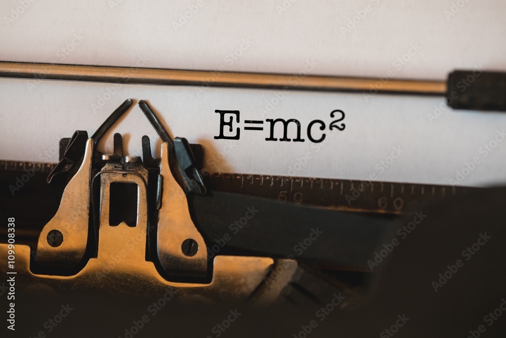 E=mc2 against close-up of typewriter