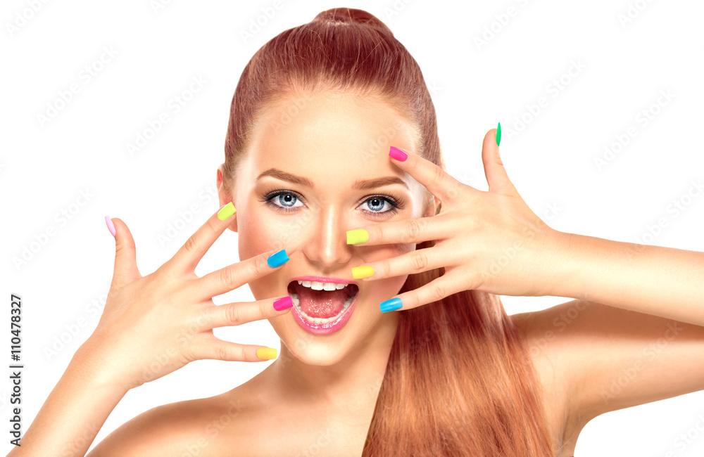 Beauty girl with colorful manicure and fashion makeup