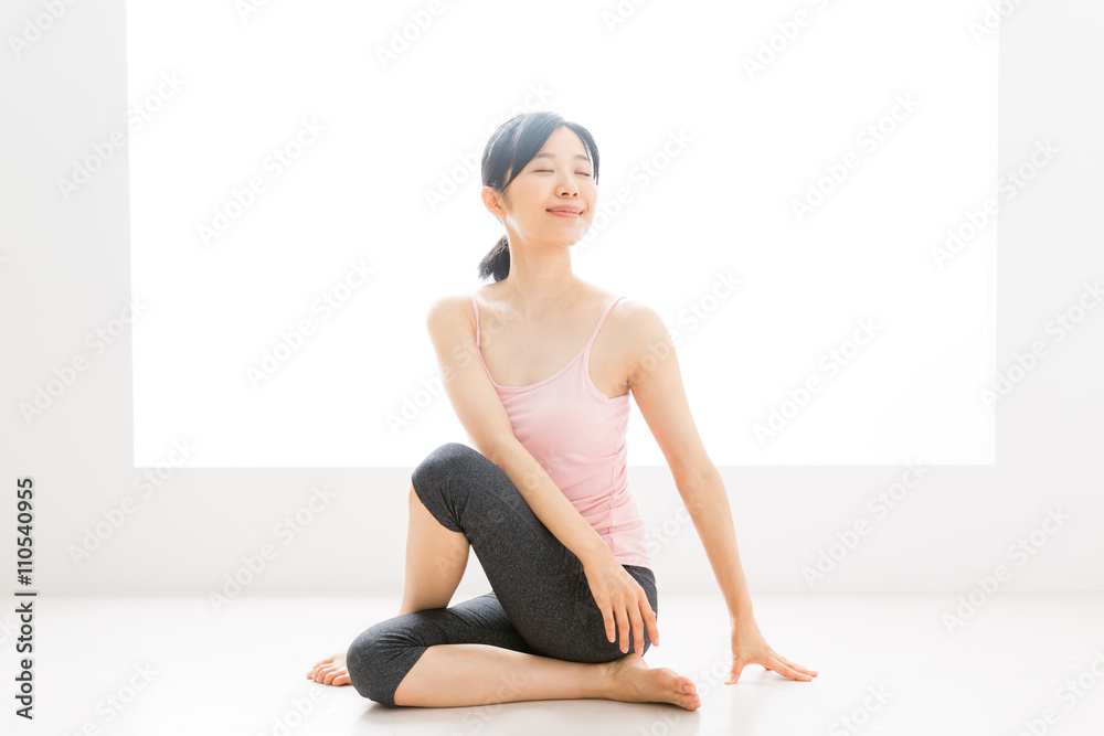 attractive asian woman exercising image