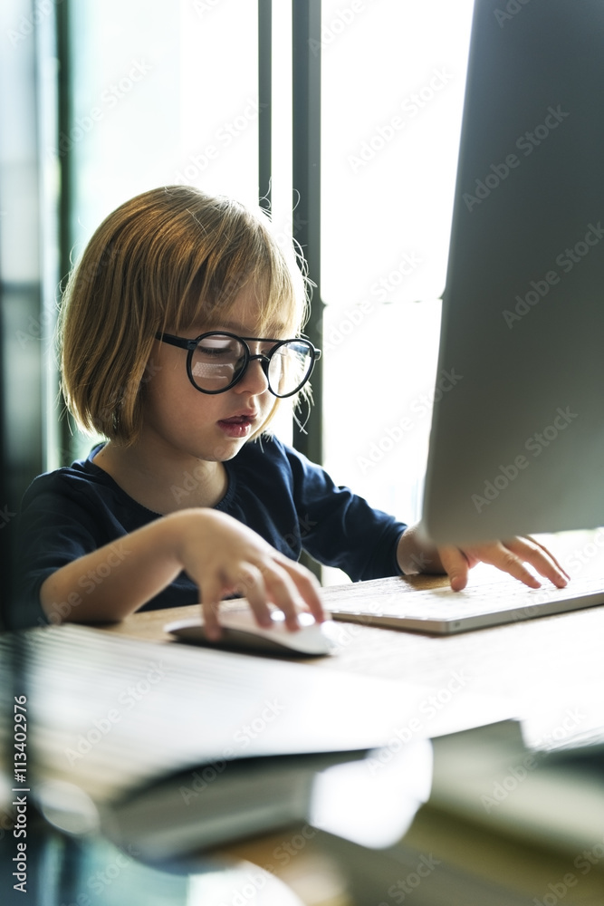 Kid Surfing Computer Internet Lifestyle Concept